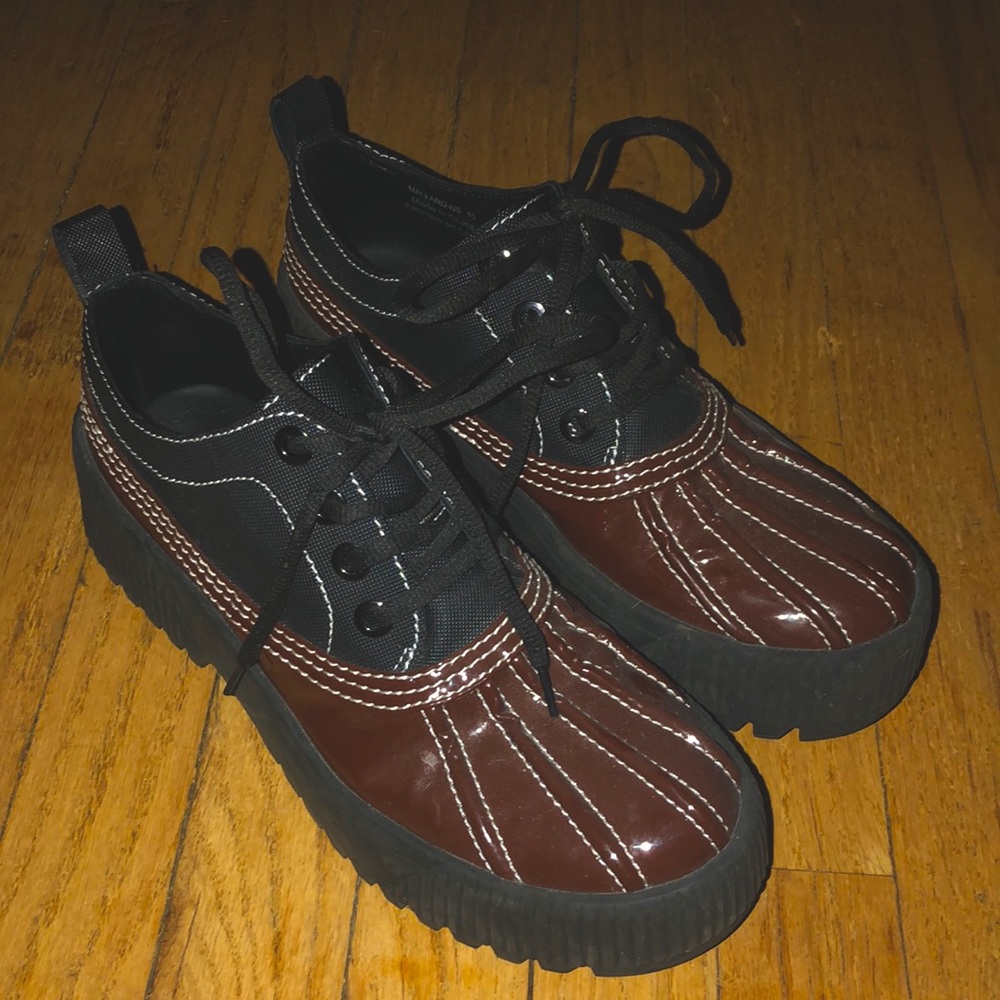Jeffery Campbell platform rain shoes.